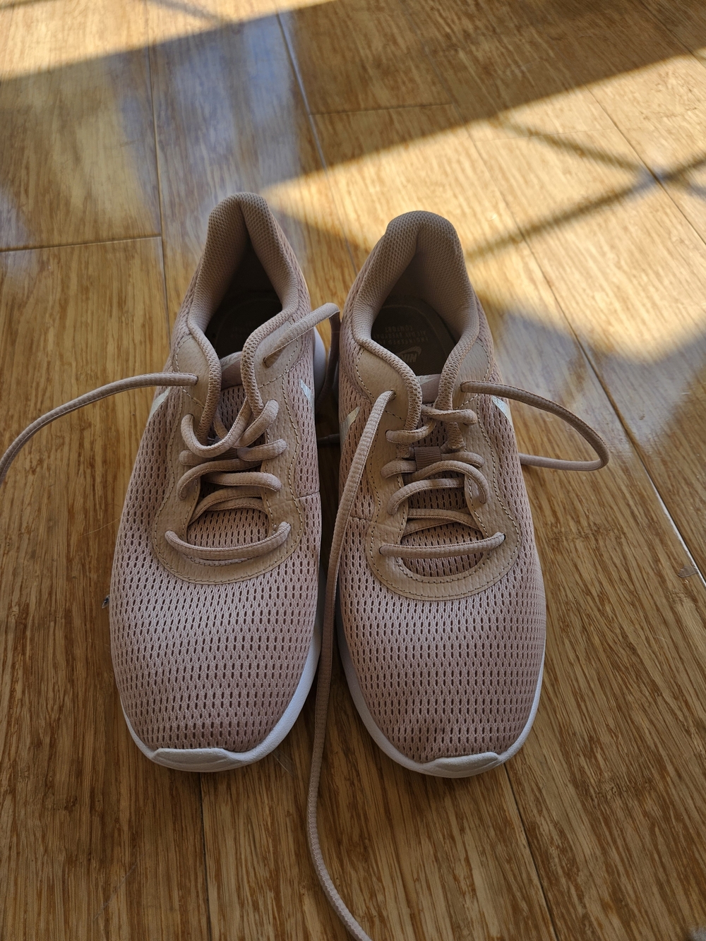 Nike Women’s Pink Mesh Athletic Sneakers